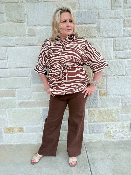 Wild & Refined: Zebra Print Drawstring Waist Button-Front Top